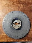 John Deere Seed Plate - A43066 Used. Price: $25.00.