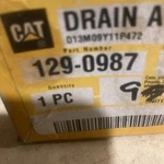 Oem Caterpillar 129-0987 Drain, New. Price: $70.00.