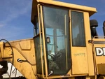 John Deere 770CH Left/driver Door Assembly - Used P/n AT107295. Price: $1559.99.