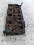 New Holland Head, Cylinder SBA111010671 Used. Price: $1150.00.