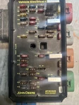 John Deere AT353045 Vehicle Controller Electrical Center- Used. Price: $325.00.