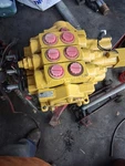 New Genuine Cat 200-7827 Valve, 2-SECTION For 420D 430D Backhoe Loader. Price: $1000.00.
