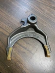 L111048 John Deere Transmission Fork Shifter Used. Price: $70.00.