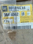 New Box Genuine Caterpillar Bearing Assembly Part # 384-4562. Price: $150.00.