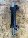 RE45885 RE284628 John Deere 5310 P/s Cylinder Core Required Deposit Remanufactured. Price: $495.00.