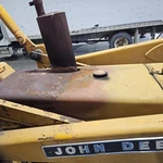 John Deere 500C Hood - Used P/n AT33264. Price: $199.99.