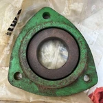 H103264 Combine Bearing Flange Half Bold Triangular 52MM Fits John Deere Used. Price: $40.00.